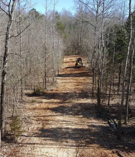 clearing a road to new home